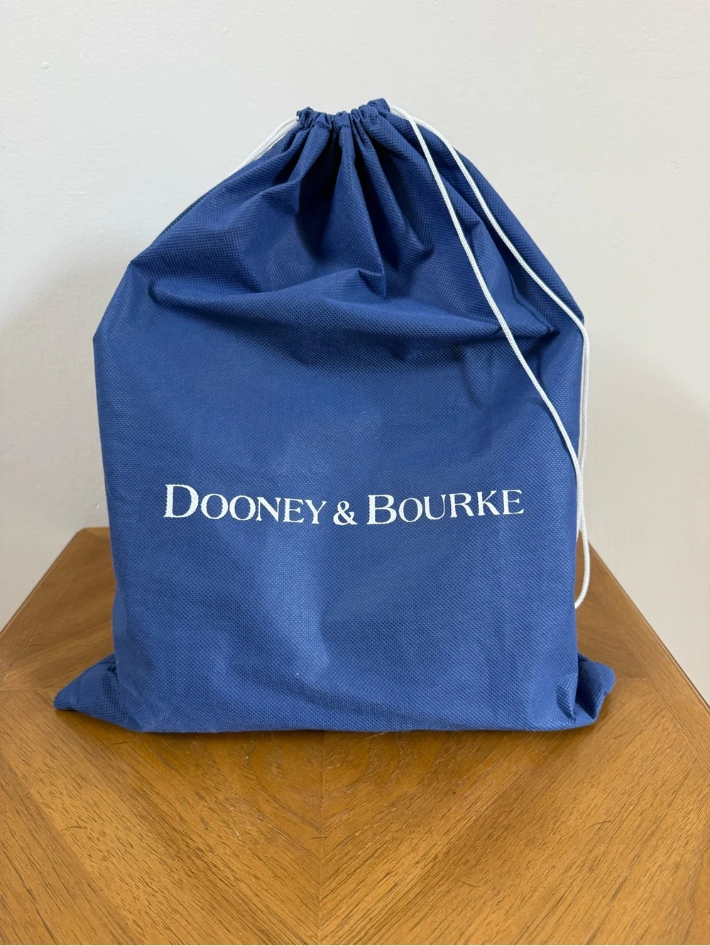 Dooney & Bourke Black Backpack with Brown Trim and Gold Hardware